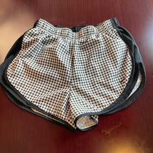 Nike, size M women’s running shorts